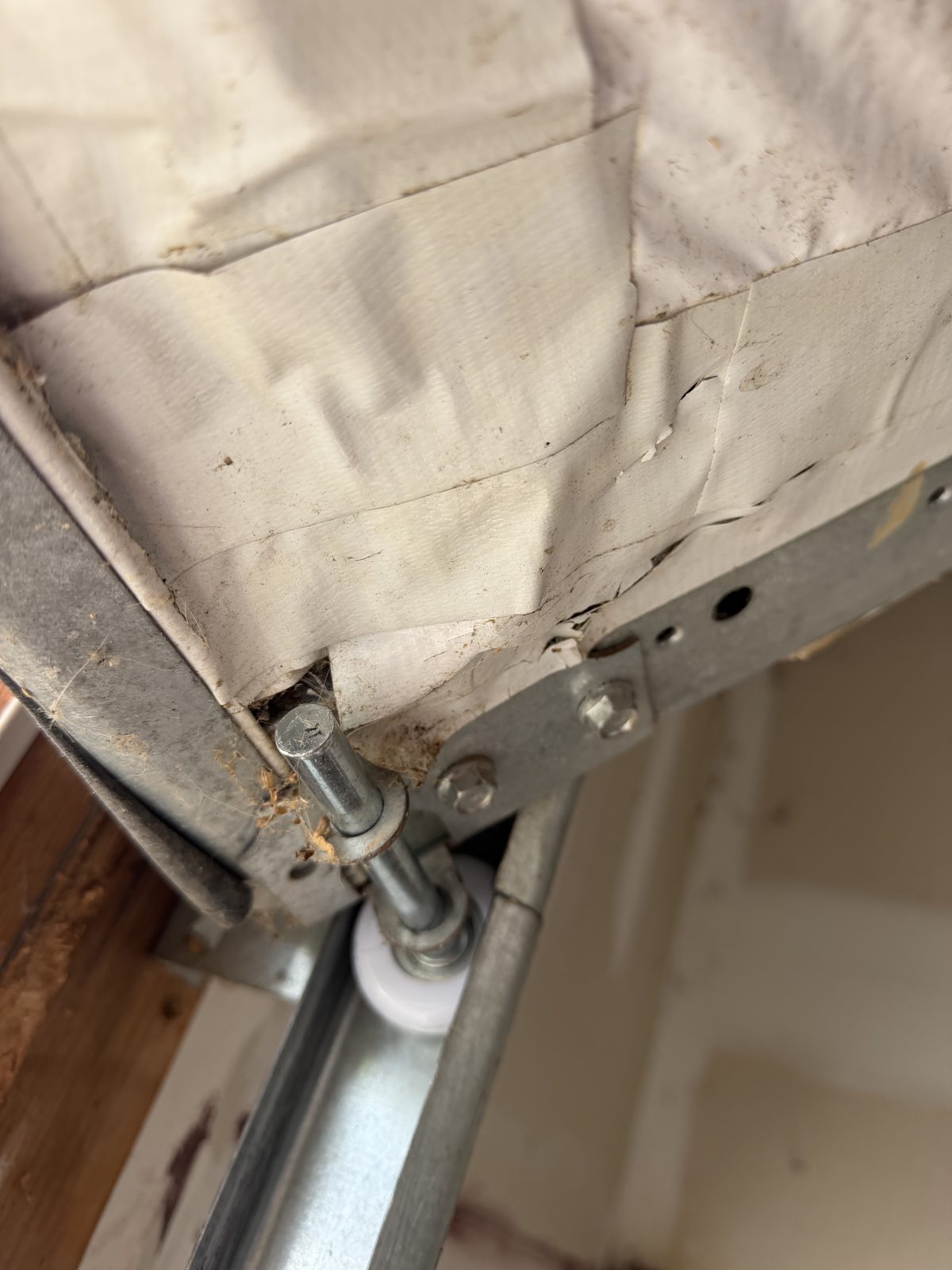 New white nylon roller and hinge at the top track corner