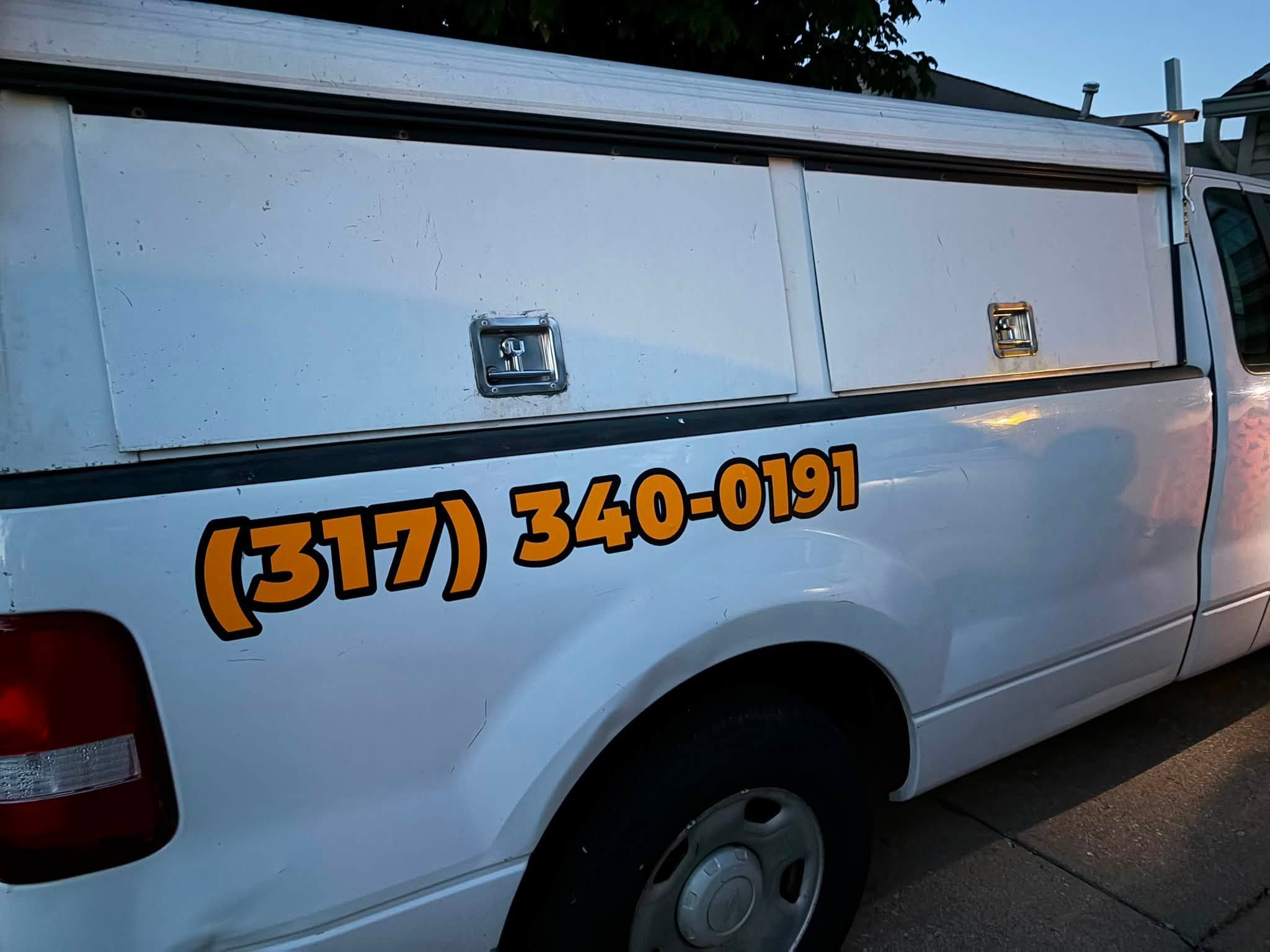 Bart's Garage Doors service truck with the new logo decal and phone number